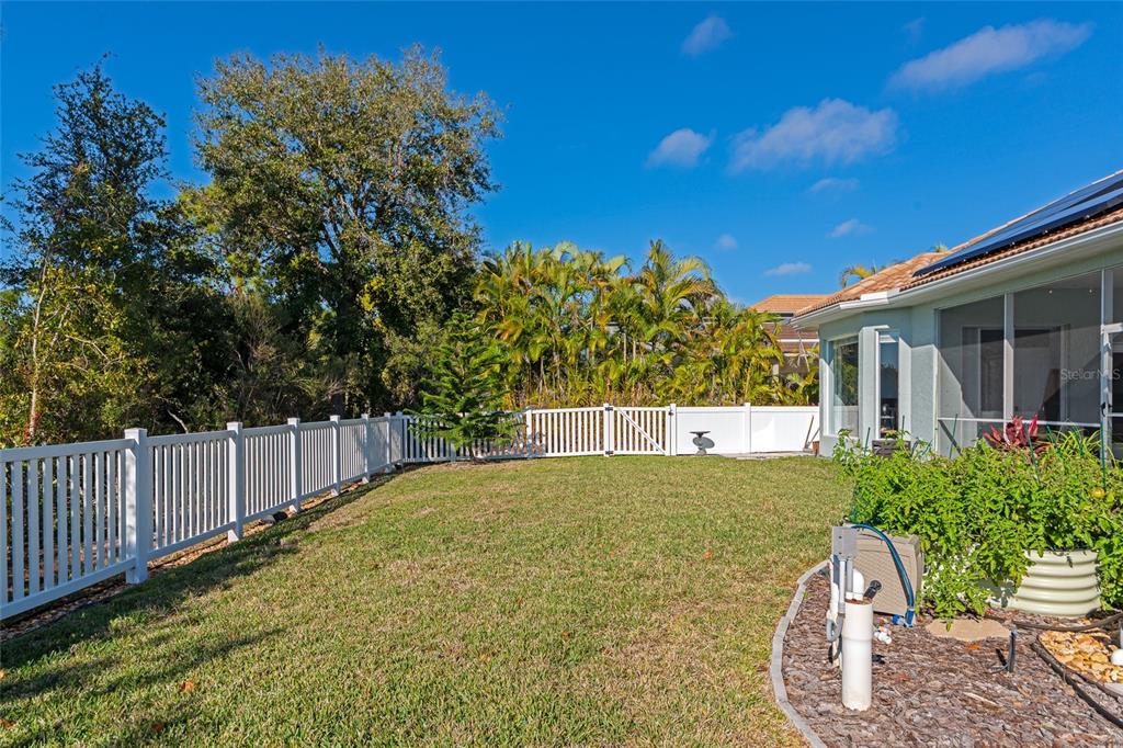 1019 Scherer Way Osprey, FL 34229 - Photo 44 of 56 a view of a backyard