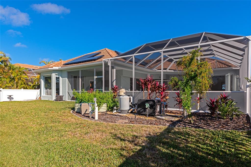 1019 Scherer Way Osprey, FL 34229 - Photo 46 of 56 a view of a house with a patio