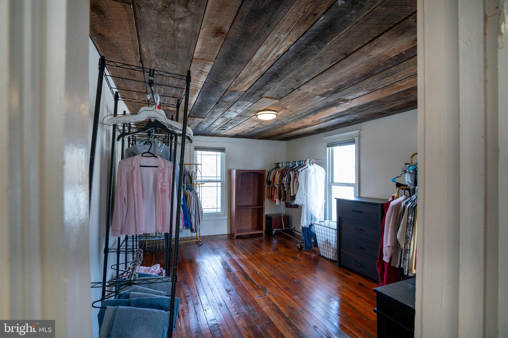 156 East Main Street Howard, PA 16841 - Photo 54 of 84 a view of a hallway with wooden floor and furniture