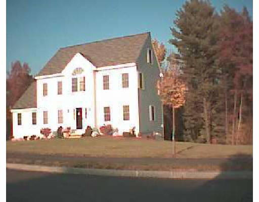 Lot 3 Jones Farm Road Pelham, NH 03076 - Photo 1 of 1 a view of a white house with a yard