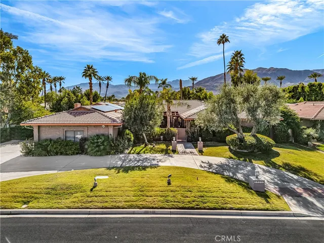 a view of swimming pool with outdoor seating