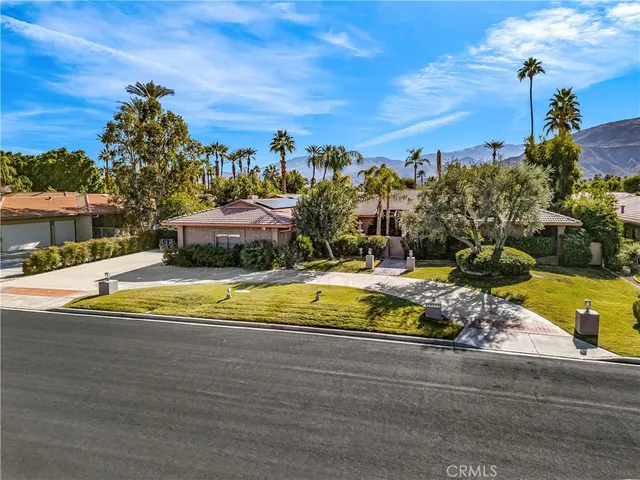 a view of a swimming pool with an ocean view