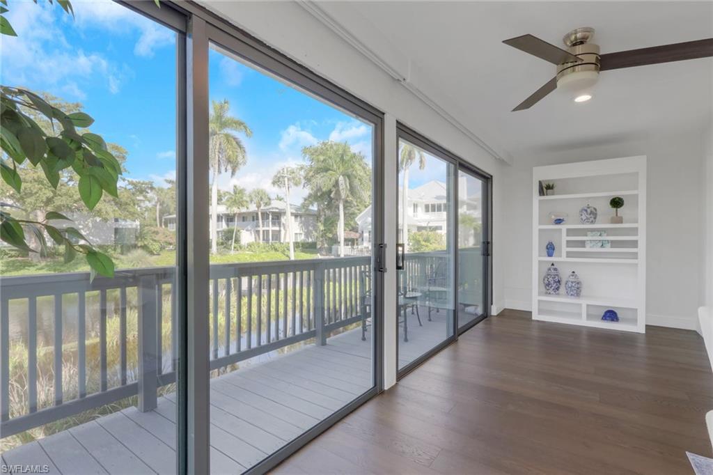 605 8th Avenue South, Unit 605 Naples, FL 34102 - Photo 29 of 50 View of unfurnished sunroom