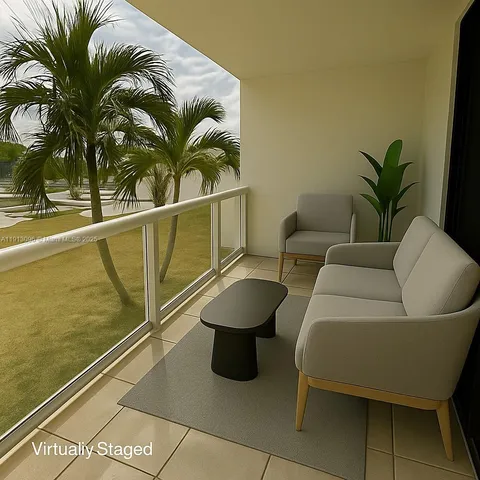 a view of a swimming pool with a terrace