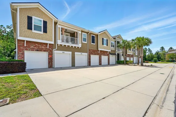 a view of a house with a large space