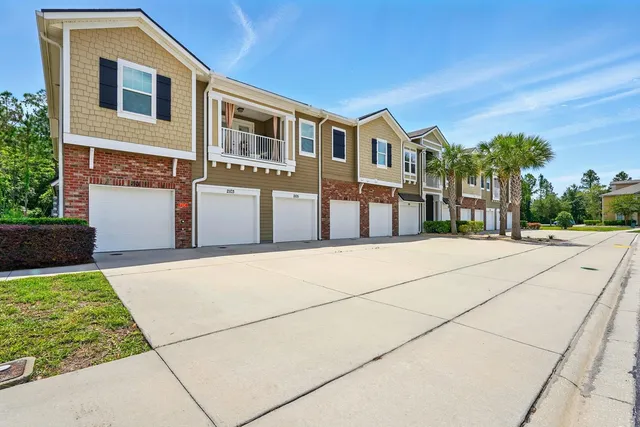 a view of a house with a large space