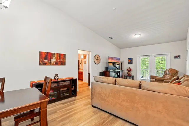 a living room with furniture and a couch