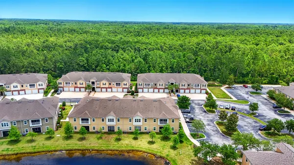 an aerial view of a house with a garden