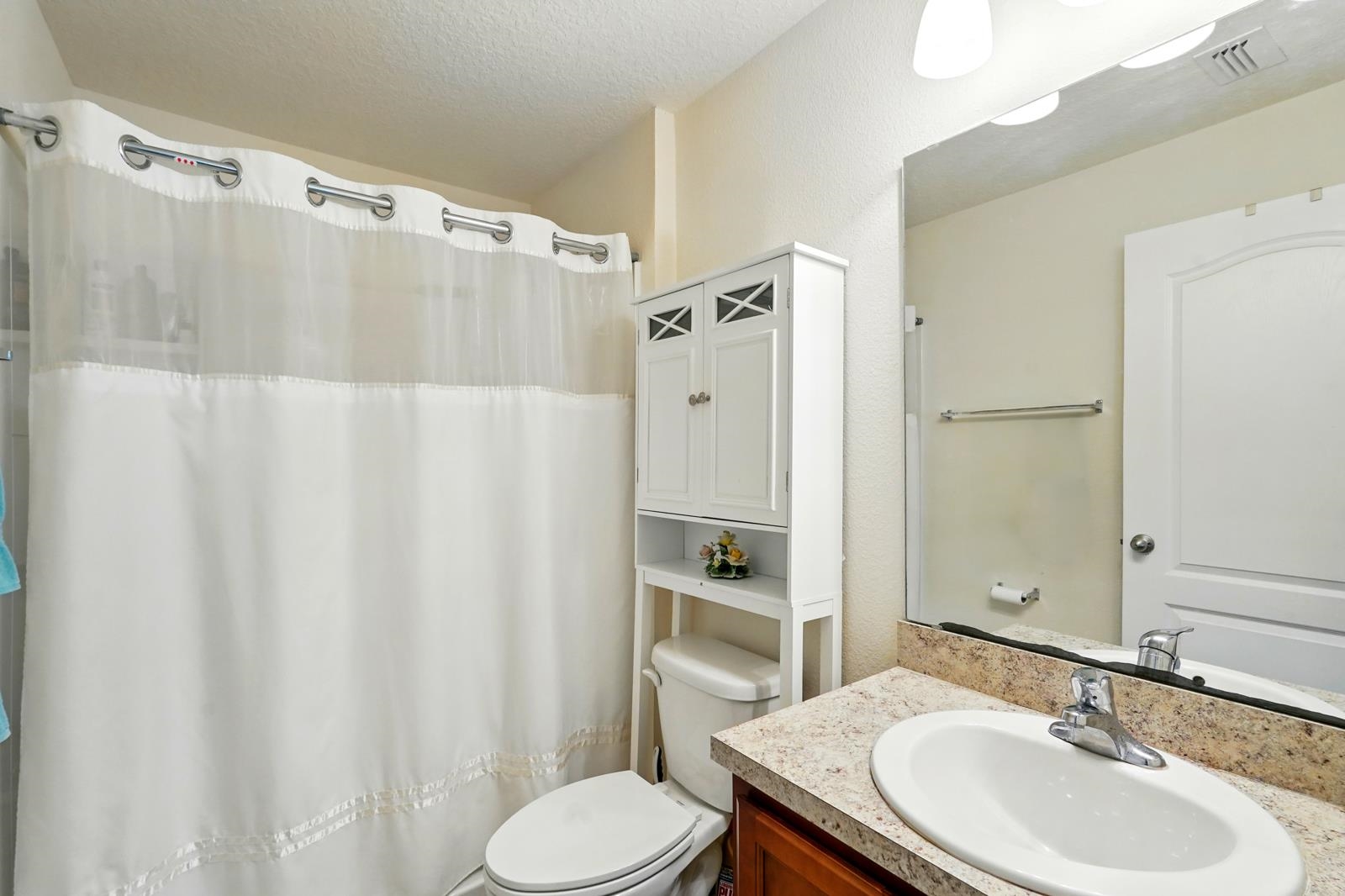 2103 Golden Lake Loop St. Augustine, FL 32084 - Photo 34 of 44 a bathroom with a sink toilet and shower
