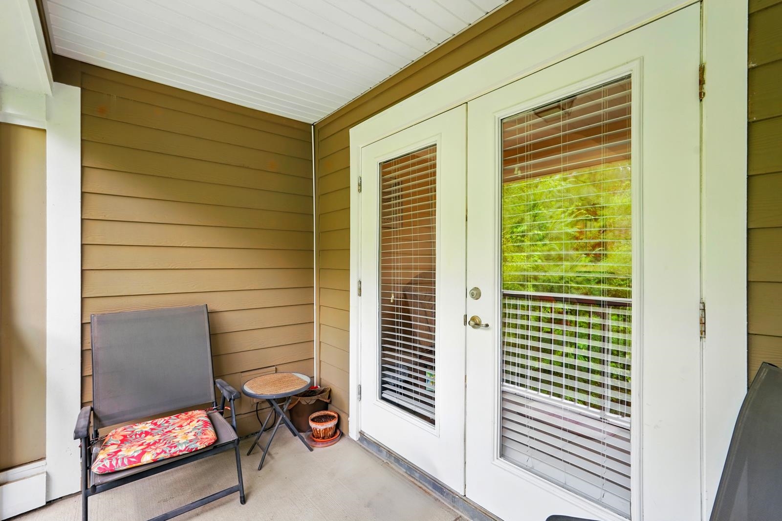 2103 Golden Lake Loop St. Augustine, FL 32084 - Photo 40 of 44 a view of a porch with a door and wooden floor