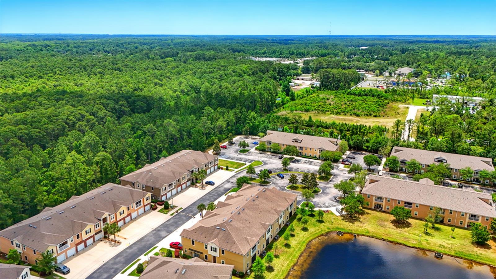 2103 Golden Lake Loop St. Augustine, FL 32084 - Photo 4 of 44 an aerial view of a house with a garden