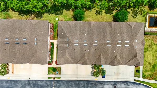 a view of front of house with a yard