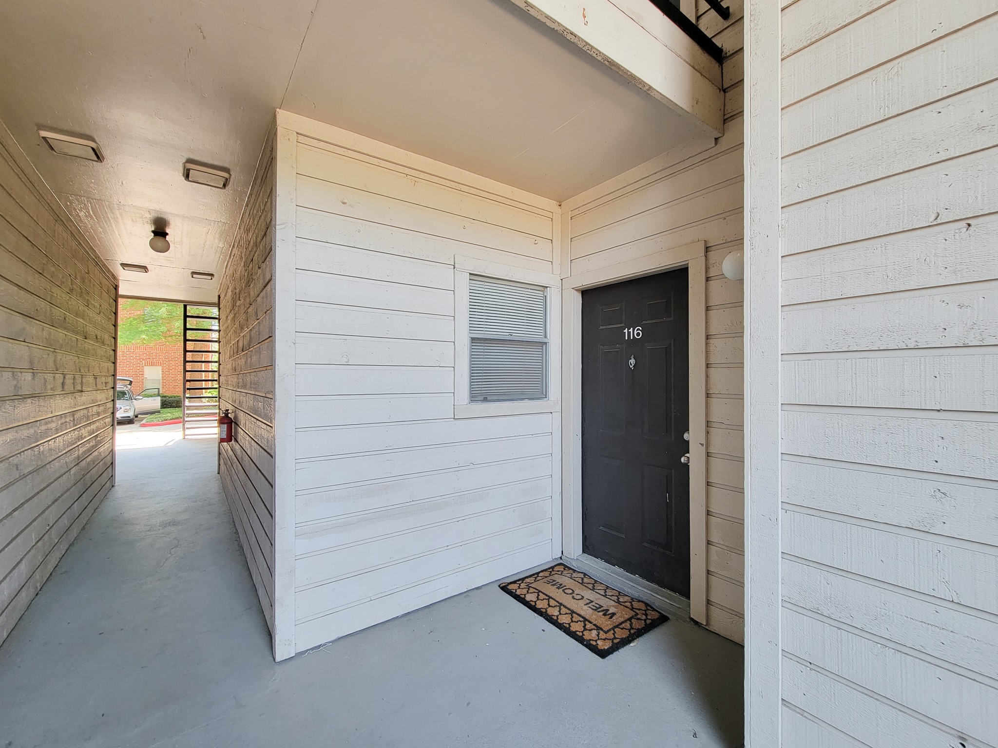 4041 Drake Street, Unit 116 Houston, TX 77005 - Photo 5 of 27 a view of a closet and utility room