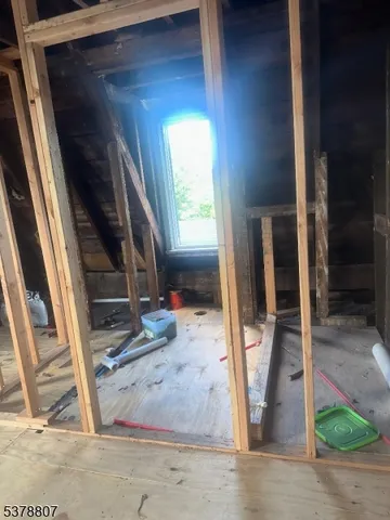 a backyard of a house with yard and garage