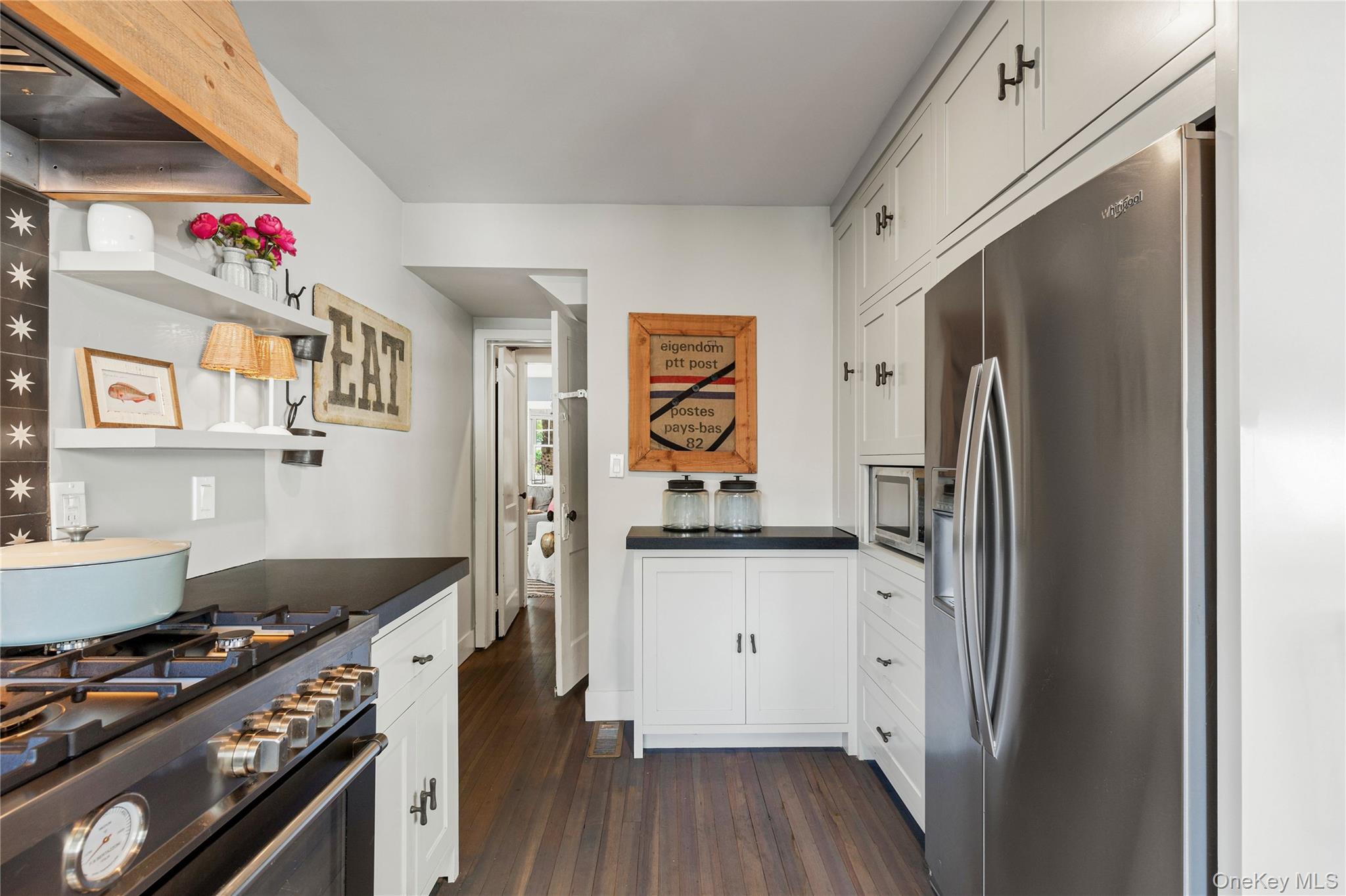 321 Rye Beach Avenue Rye, NY 10580 - Photo 21 of 36 New kitchen featuring stainless steel appliances, cabinetry, countertop & open shelves
