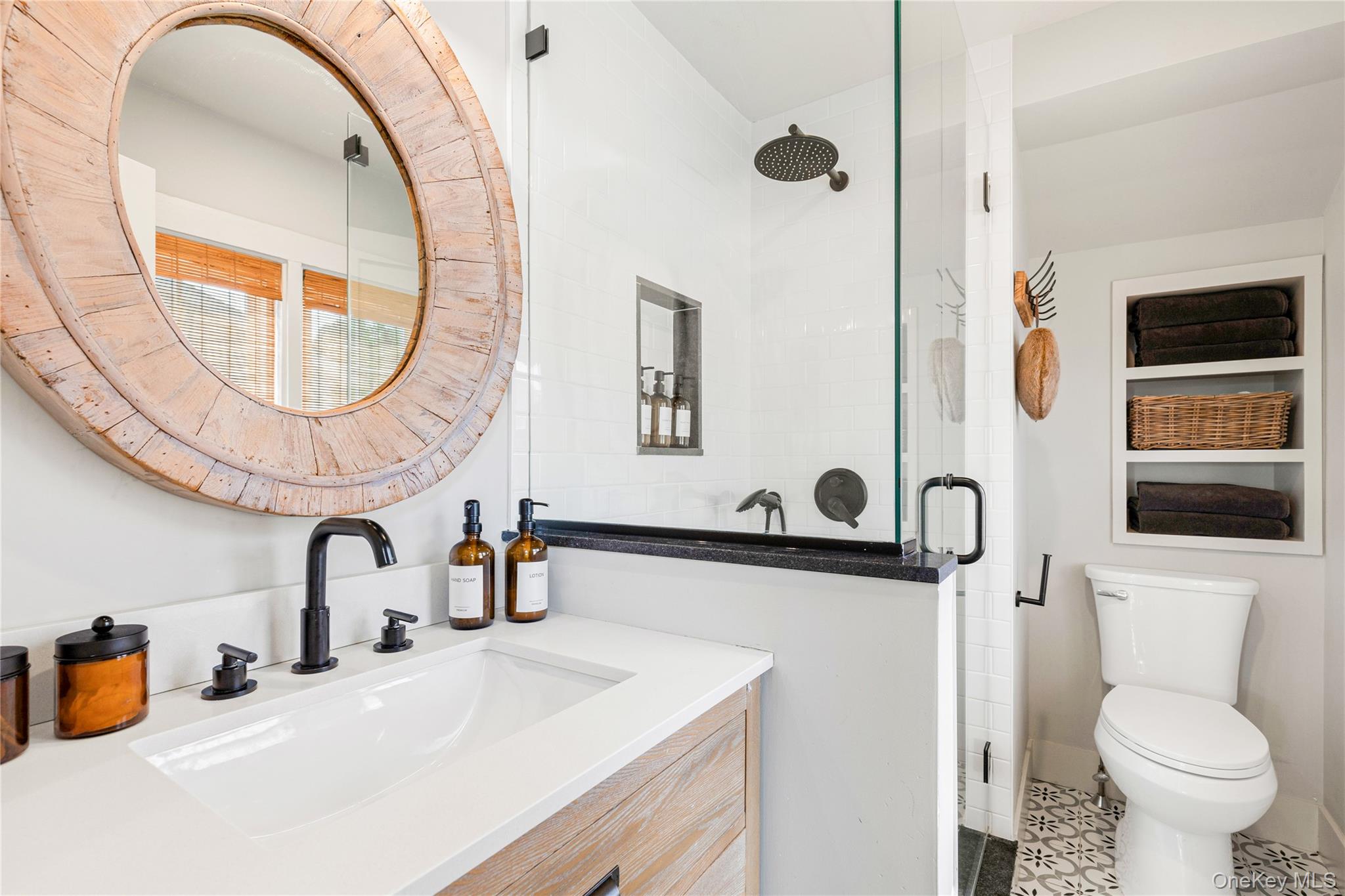 321 Rye Beach Avenue Rye, NY 10580 - Photo 24 of 36 New Primary bathroom with vanity, a shower stall, and tile patterned flooring