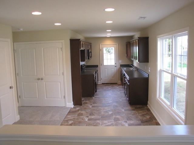 402 Liberty Road Northeast Roanoke, VA 24012 - Photo 15 of 31 Living room into kitchen/dining area