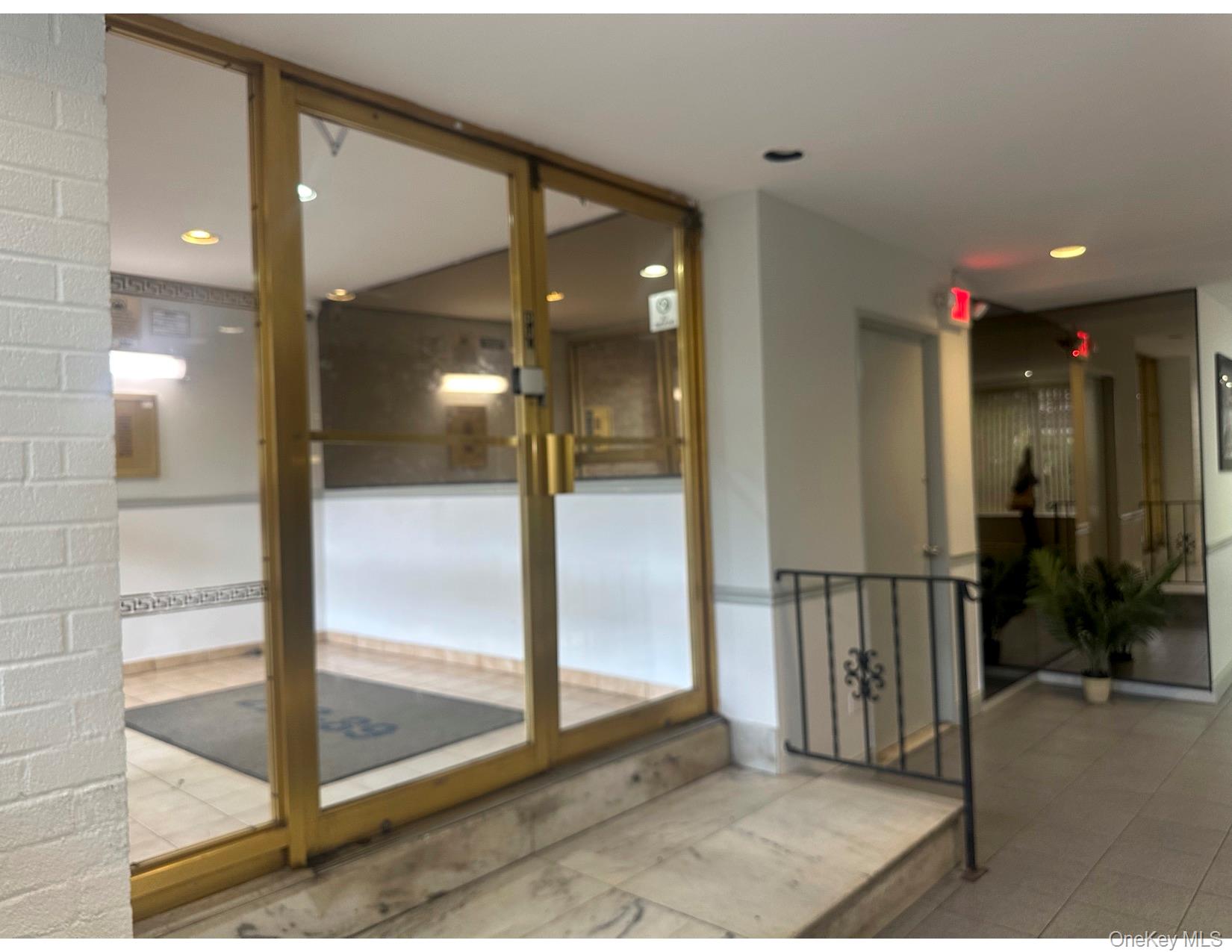222-89 Braddock Avenue, Unit 1G Queens, NY 11428 - Photo 10 of 13 a view of a lobby door