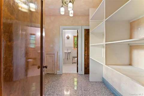 a bathroom with a sink a bathtub and a window