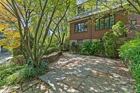 a backyard of a house with lots of green space