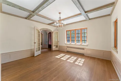 a view of livingroom with window ceiling fan and hardwood floor