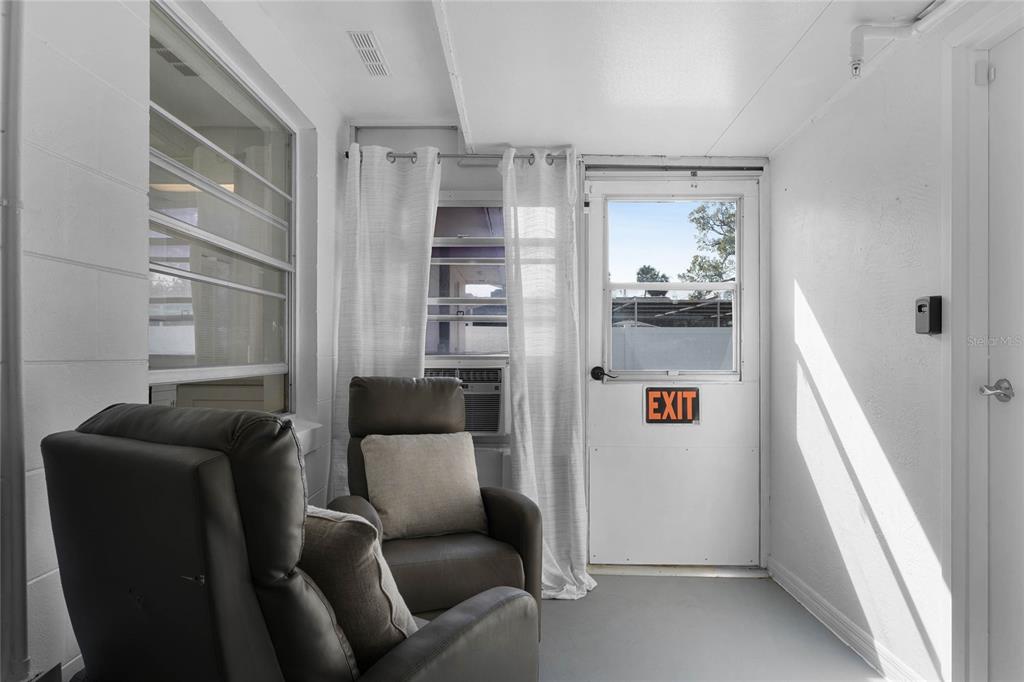 1312 Mardrake Road Daytona Beach, FL 32114 - Photo 8 of 33 a living room with furniture and a window