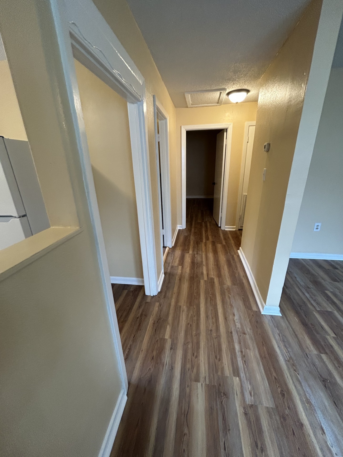 2109 Briar Lane La Marque, TX 77568 - Photo 10 of 20 a view of a hallway with wooden floor and staircase