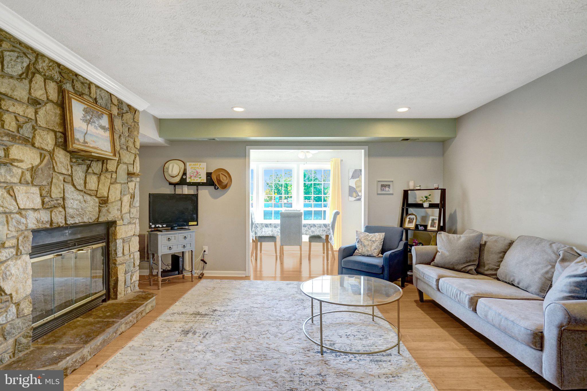 10107 Oakton Terrace Road Oakton, VA 22124 - Photo 6 of 29 Living Room with Stone Fireplace