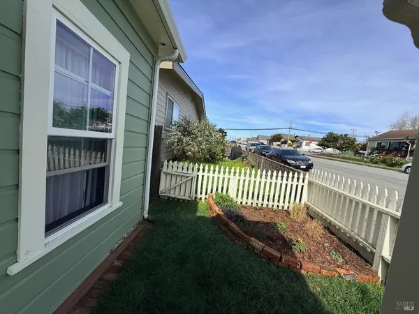 a view of a porch with a yard