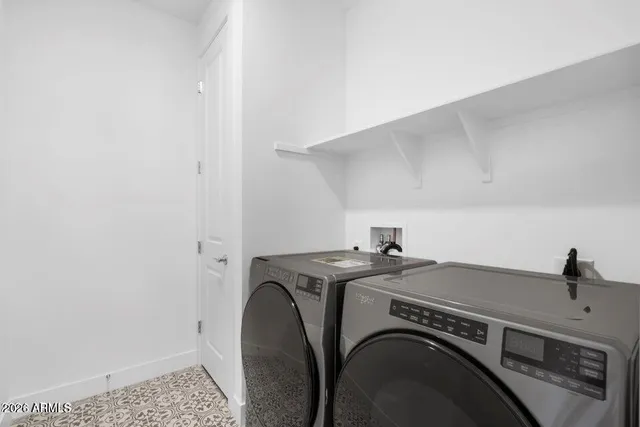 a bathroom with a sink toilet and a mirror