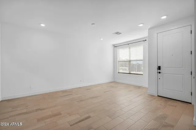 a view of a kitchen with a sink and a window