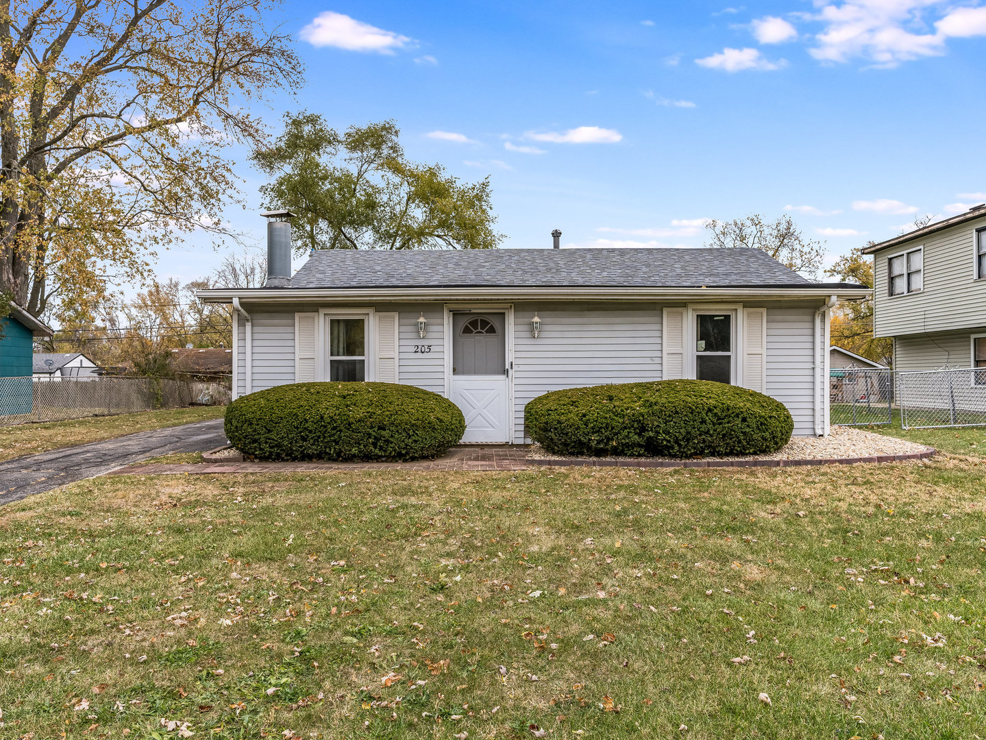 205 Luana Road Joliet, IL 60433 - Photo 1 of 13 a view of front of house with a yard