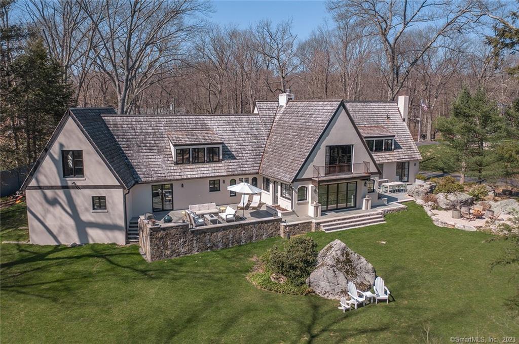 8 Crooked Mile Road Westport, CT 06880 - Photo 1 of 1 front view of house with a yard