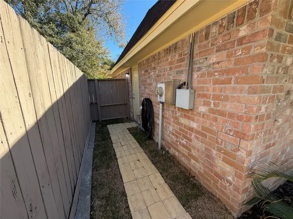 a view of a backyard of the house