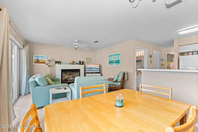 a bedroom with a bed a table and chair