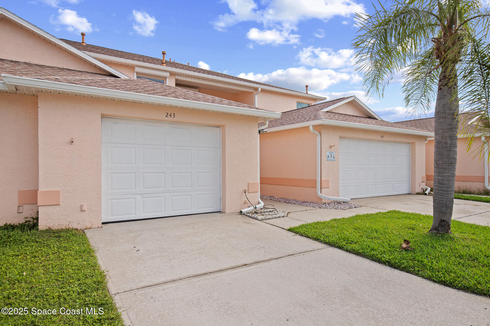 243 Forecast Lane, Unit 421 Rockledge, FL 32955 - Photo 2 of 43 a front view of house with yard