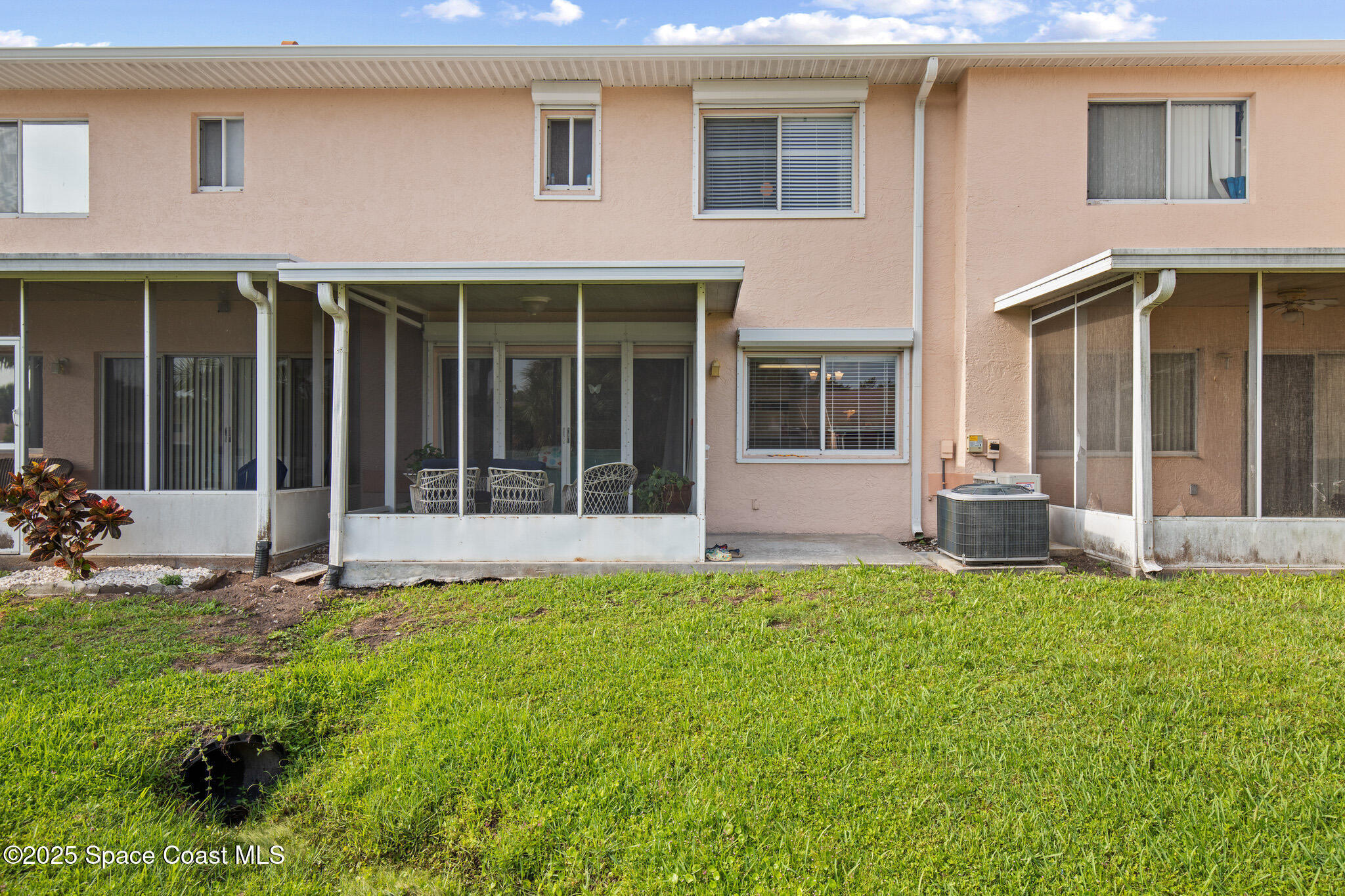 243 Forecast Lane, Unit 421 Rockledge, FL 32955 - Photo 29 of 43 front view of a house with a yard