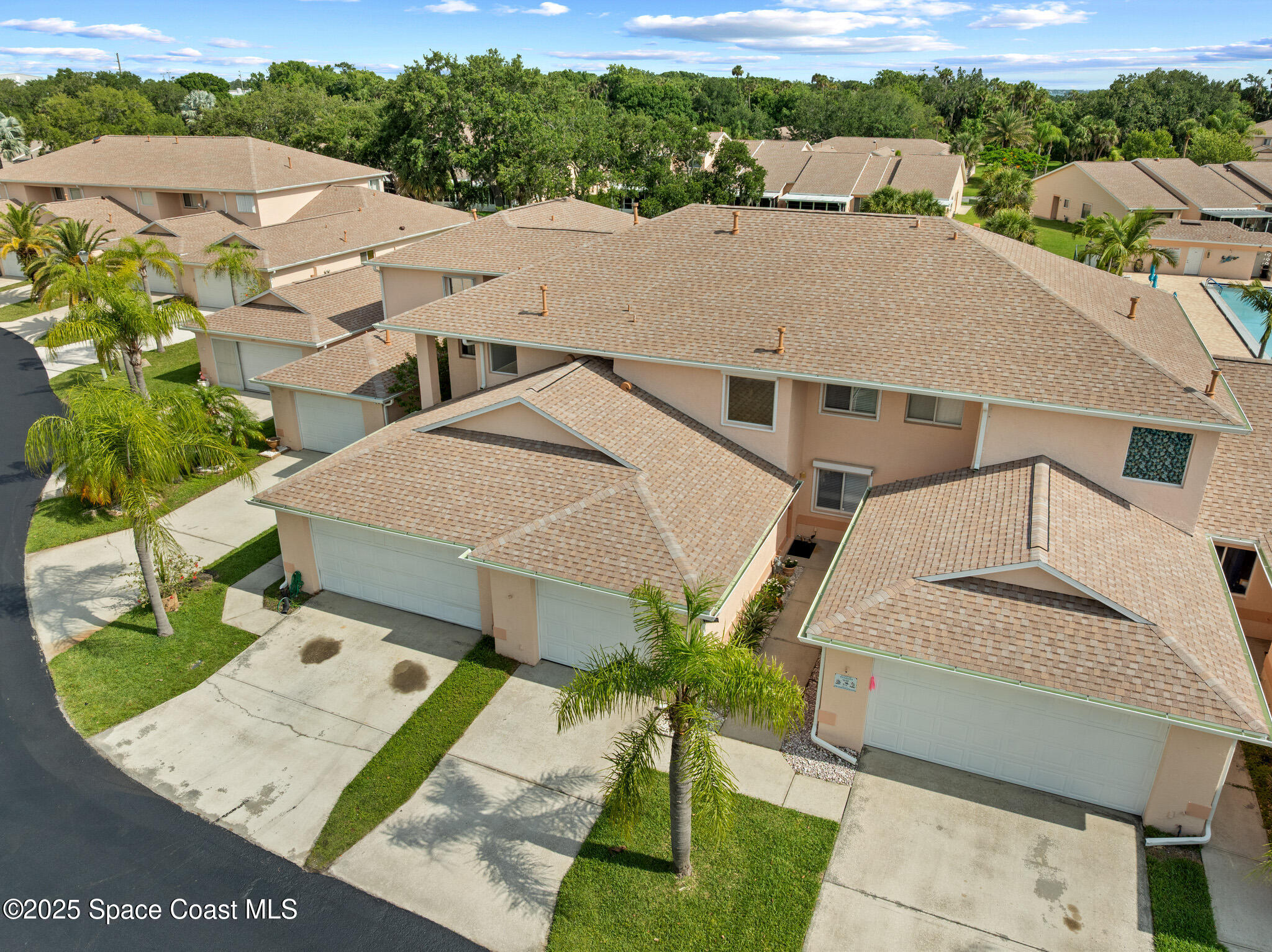 243 Forecast Lane, Unit 421 Rockledge, FL 32955 - Photo 5 of 43 an aerial view of a house with a yard