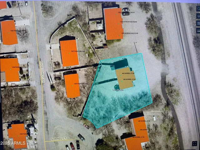 an aerial view of a house with outdoor space