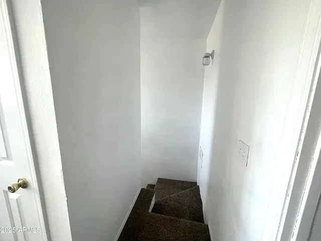 a view of hallway with a sink