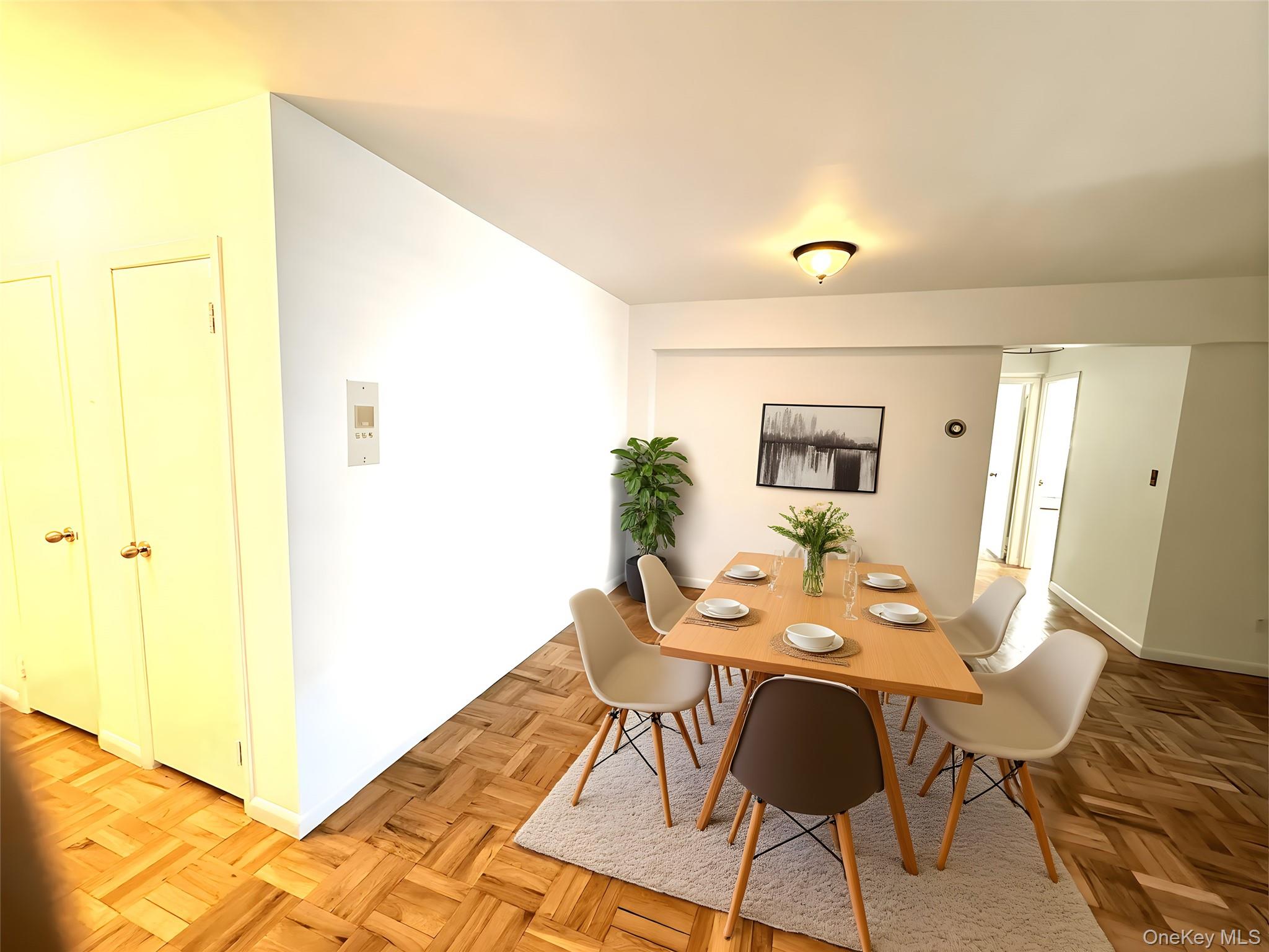 40 Daley Place, Unit 124 Lynbrook, NY 11563 - Photo 13 of 16 Dining Room -Staged