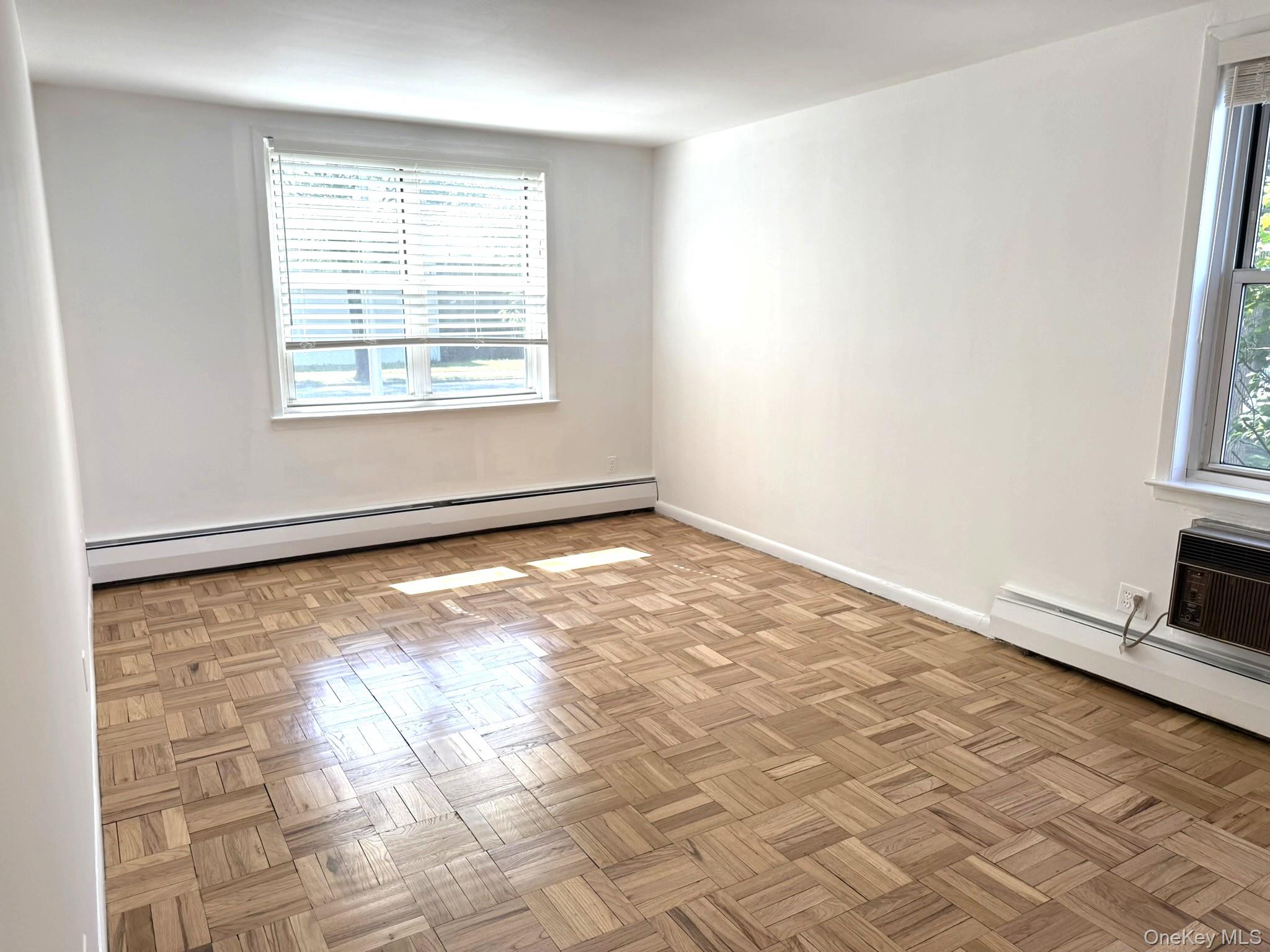 40 Daley Place, Unit 124 Lynbrook, NY 11563 - Photo 4 of 16 Primary Bedroom