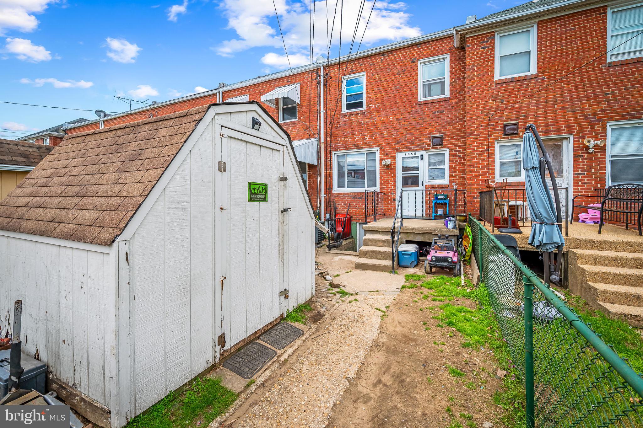 2855 Plainfield Road Baltimore, MD 21222 - Photo 25 of 27 a view of an house with backyard and sitting area