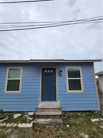 a brick building with a large window