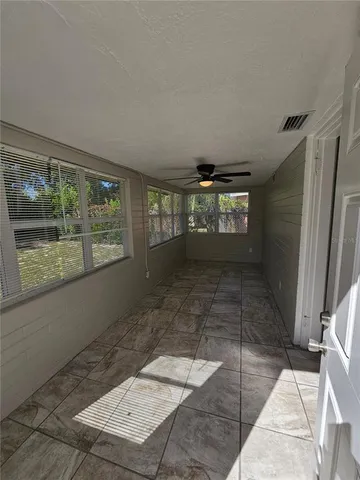 a view of a yard with a tree