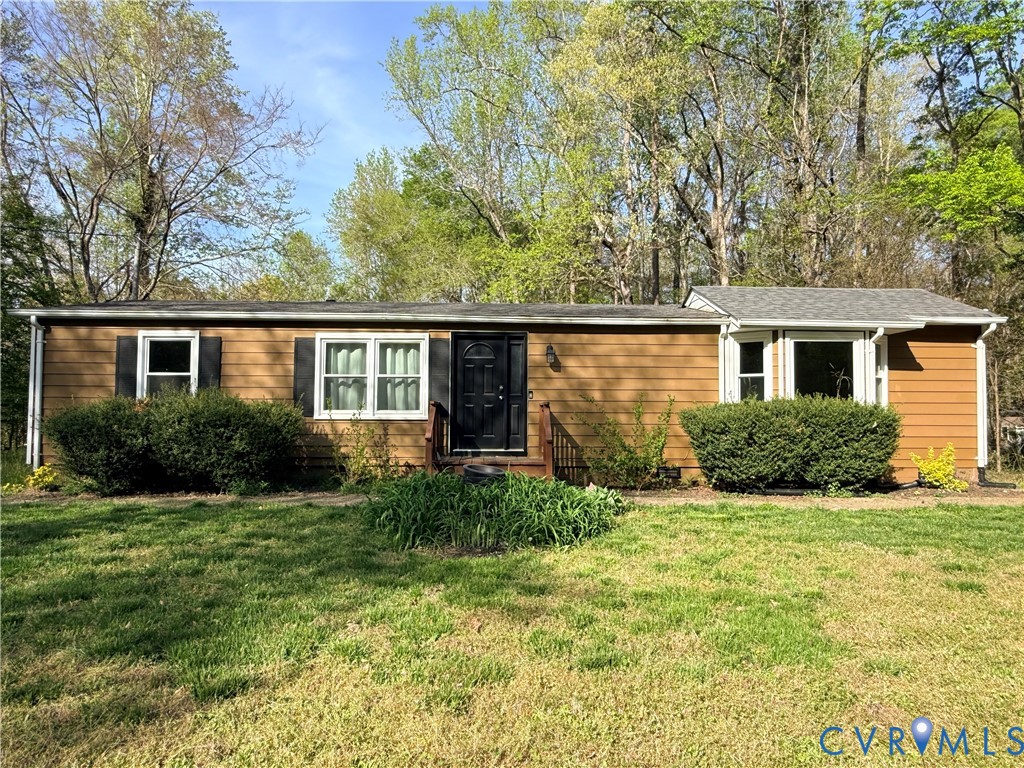 front view of a house with a yard