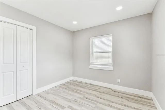 a bathroom with a toilet and a bathtub