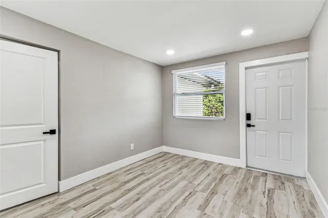 an aerial view of a house with a garden
