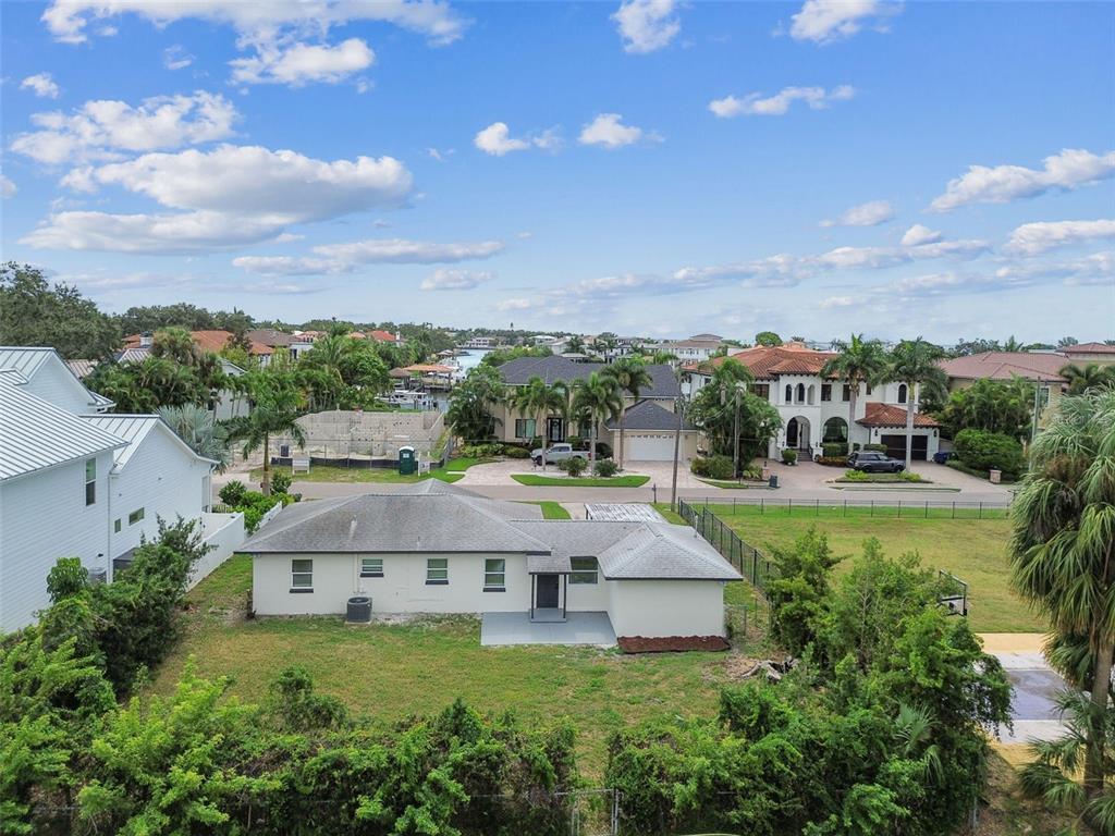 5 West Spanish Main Street Tampa, FL 33609 - Photo 69 of 72 a aerial view of a house with big yard and large trees