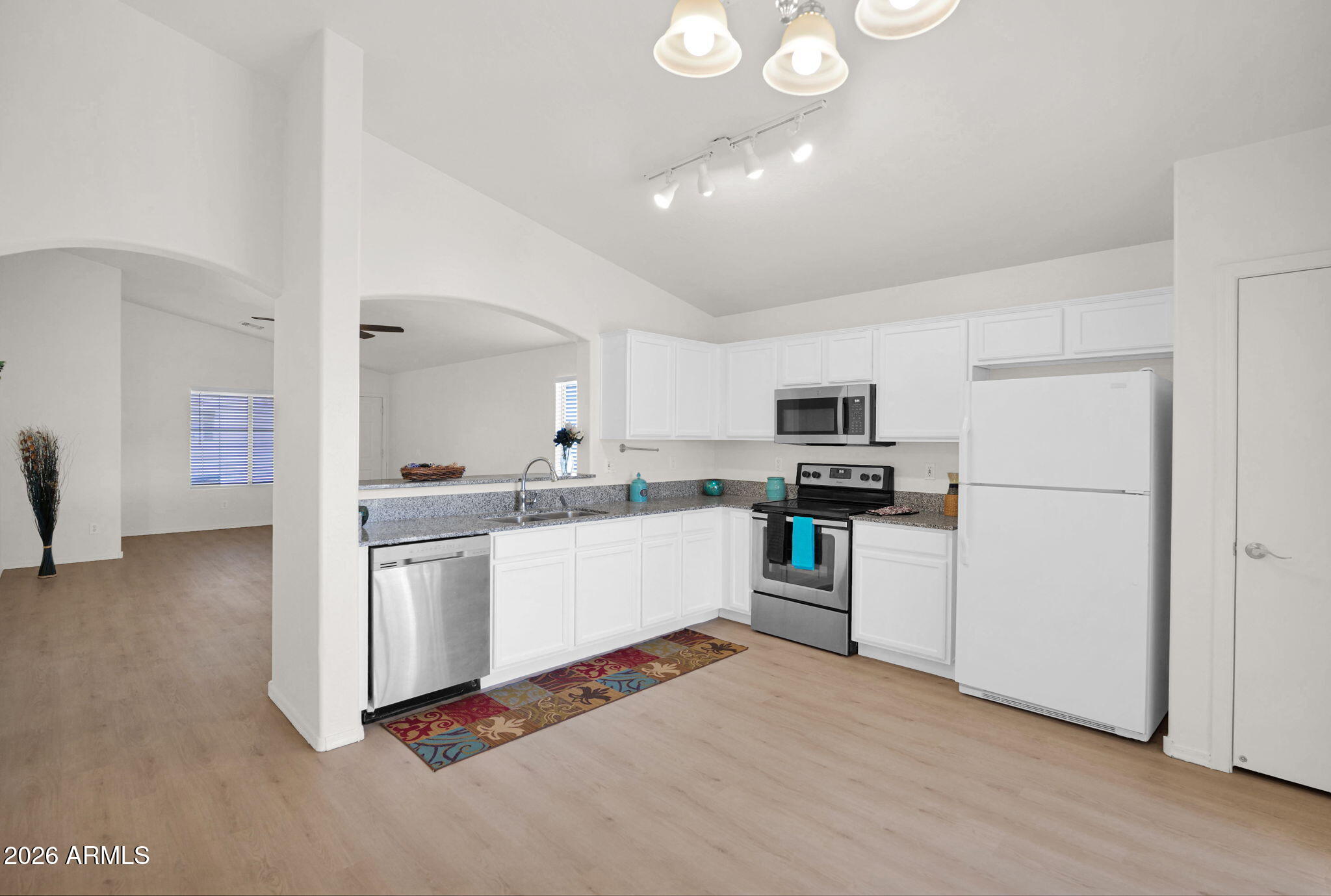 429 South Labelle Mesa, AZ 85208 - Photo 11 of 35 a kitchen with refrigerator and stove